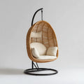 Fauteuil suspendu sur pied en rotin naturel beige et acier noir forme œuf 105 x 105 x 195 cm